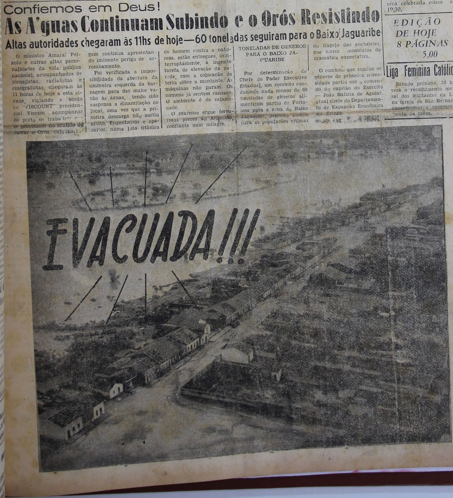 Capa de 25 de março de 1960, com a foto aérea de uma cidade do vale cercada pela água